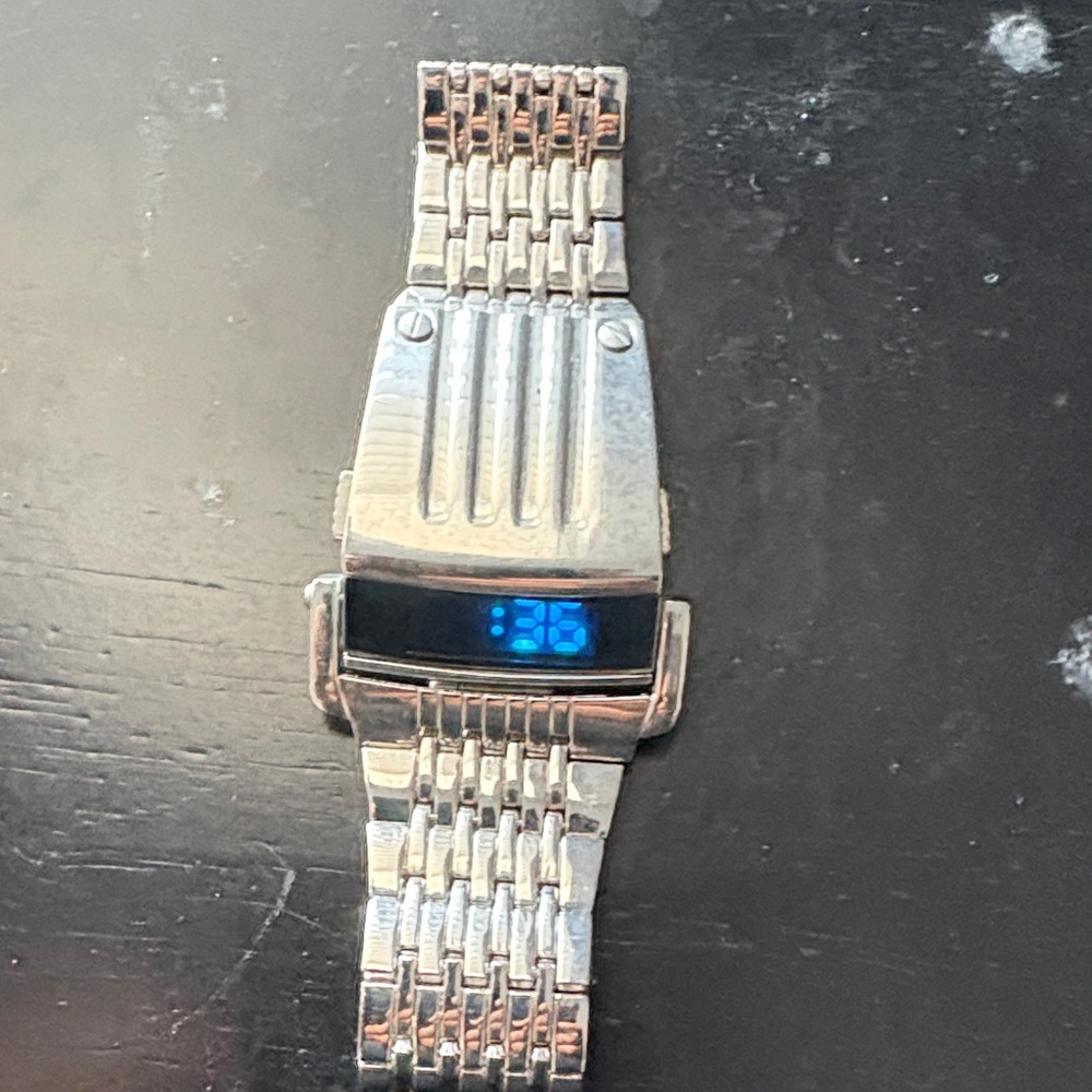 Elegant Silver Smartwatch with Blue Display